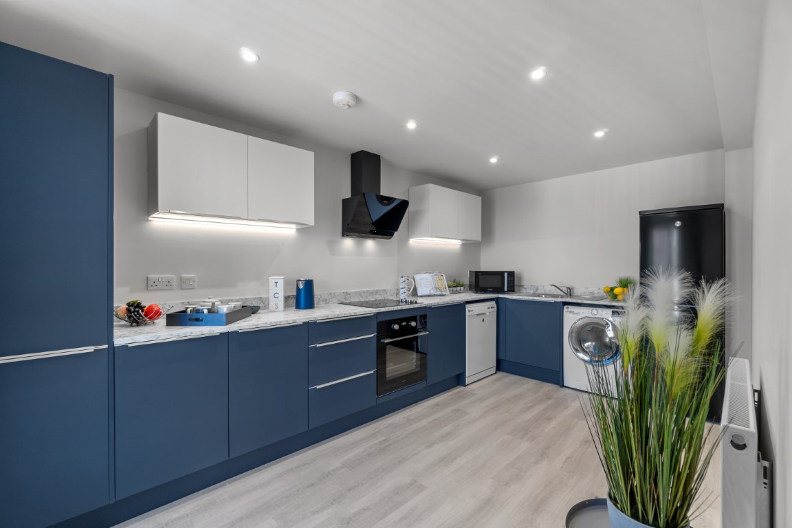 Fully fitted blue kitchen